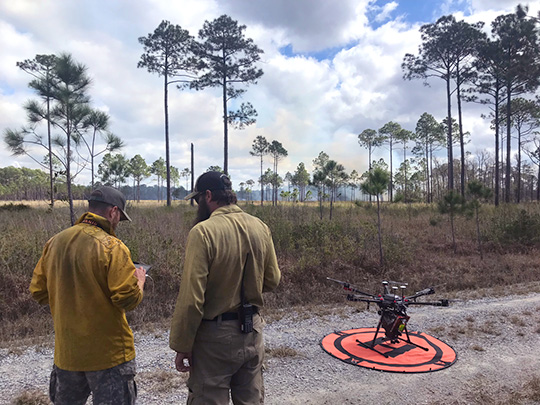 Image of the March 2022 STEReO field test, showing wildfire emergency responders in training during a prescribed burn