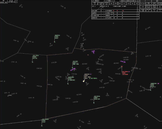 Image of Controller display with equipped (dim limited datablock) and unequipped (colored full datablock) aircraft in mixed separation-assurance airspace