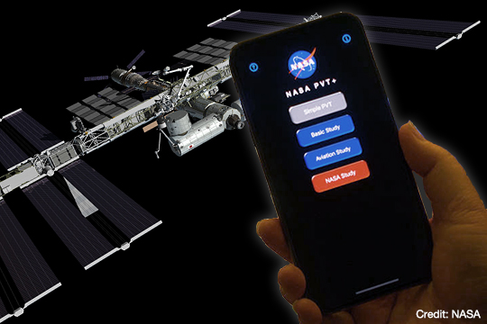 Image of the NASA PVT+ app on a phone and the International Space Station